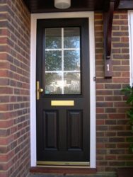 Black and white composite entrance door