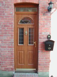 Cherry Oak effect composite entrance door