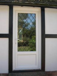 White PVC door with cross style leading