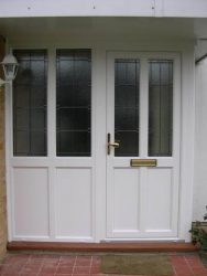 White uPVC entrance door with a side panel