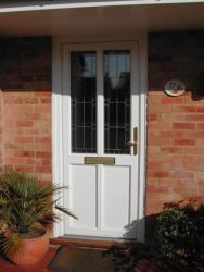 White PVC entrance door with leaded glass
