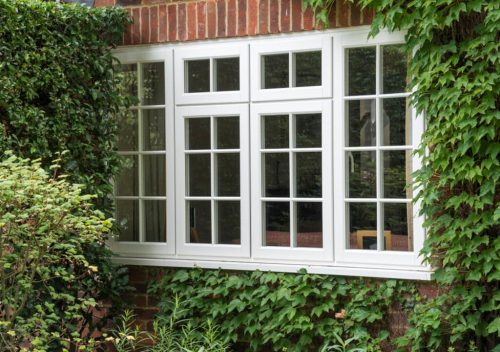 White casement timber effect window