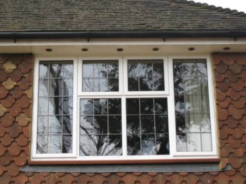 White leaded aluminium casement window