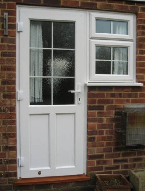 White uPVC front door with astragal bars