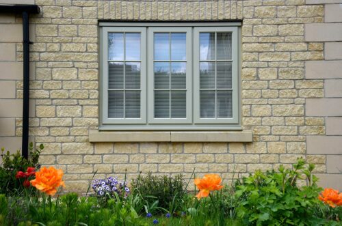 Beautiful timber lipped casement window finished in French Grey