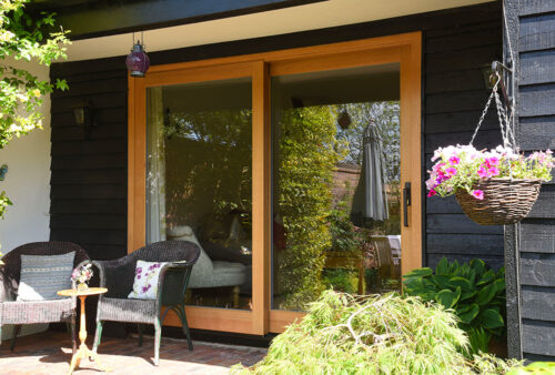 Timber-Patio-doors-finished-in-a-Light-Oak-stain