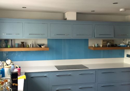 Blue kitchen glass splash back