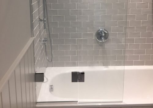 Folding glass shower screen