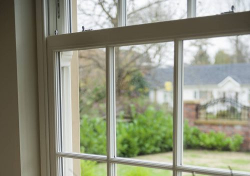 Large uPVC sliding sash window close up