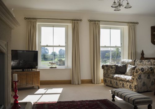 Living room uPVC sliding sash window