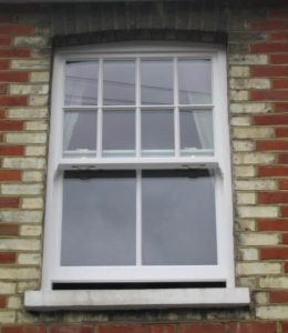 An open white timber sliding sash window