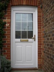 uPVC entrance door with astragal bars