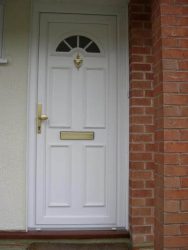 White uPVC entrance door with gold hardware