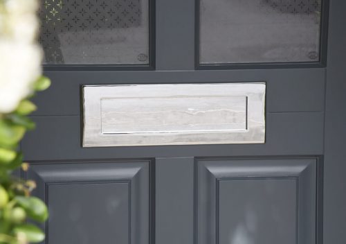 Timber entrance door letterplate close up