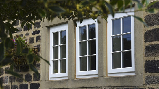 White timber casement window