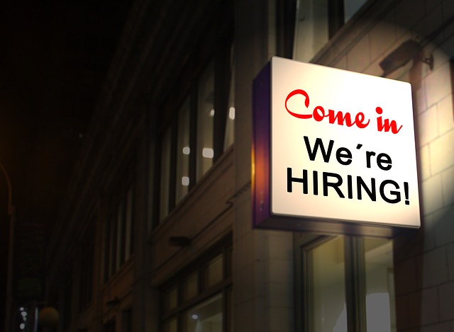 Building with a hiring sign