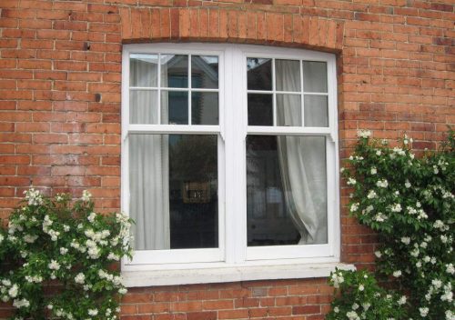 Dual White uPVC Vertical Sliders