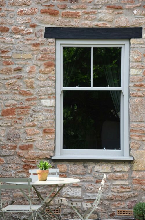 Timber-sliding-sash-window-finished-in-shade-of-Porcelain